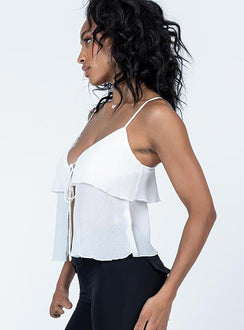 side view of model wearing Princess Polly Rivetto Top White Sleeveless Plunger 