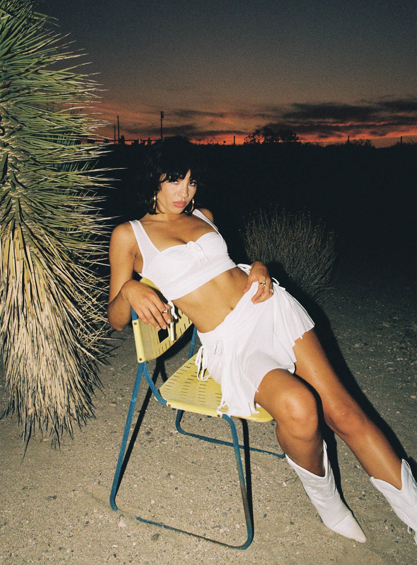 Matching 3 piece set Singlet top  Low scoop neckline  Strapless crop top  Adjustable tie fastening at bust  High waisted mini skirt  Adjustable tie ruching at sides of top & skirt  