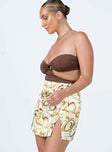   side view of model wearing Princess Polly Dillion Mini Skirt Yellow Swirl 