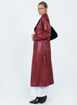 Long coat Faux leather material Lapel collar Removable waist tie Belt loops at waist Twin hip pockets Split hem at back