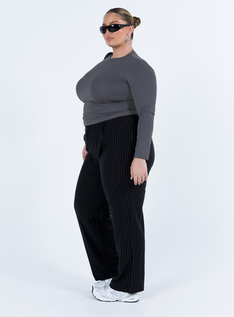 Front view of model wearing  front Princess Polly High Waisted Pants High Waisted Pants  Titius Pants Black Curve