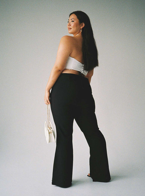 back view of model wearing Princess Polly Lovey Pants Black Curve 