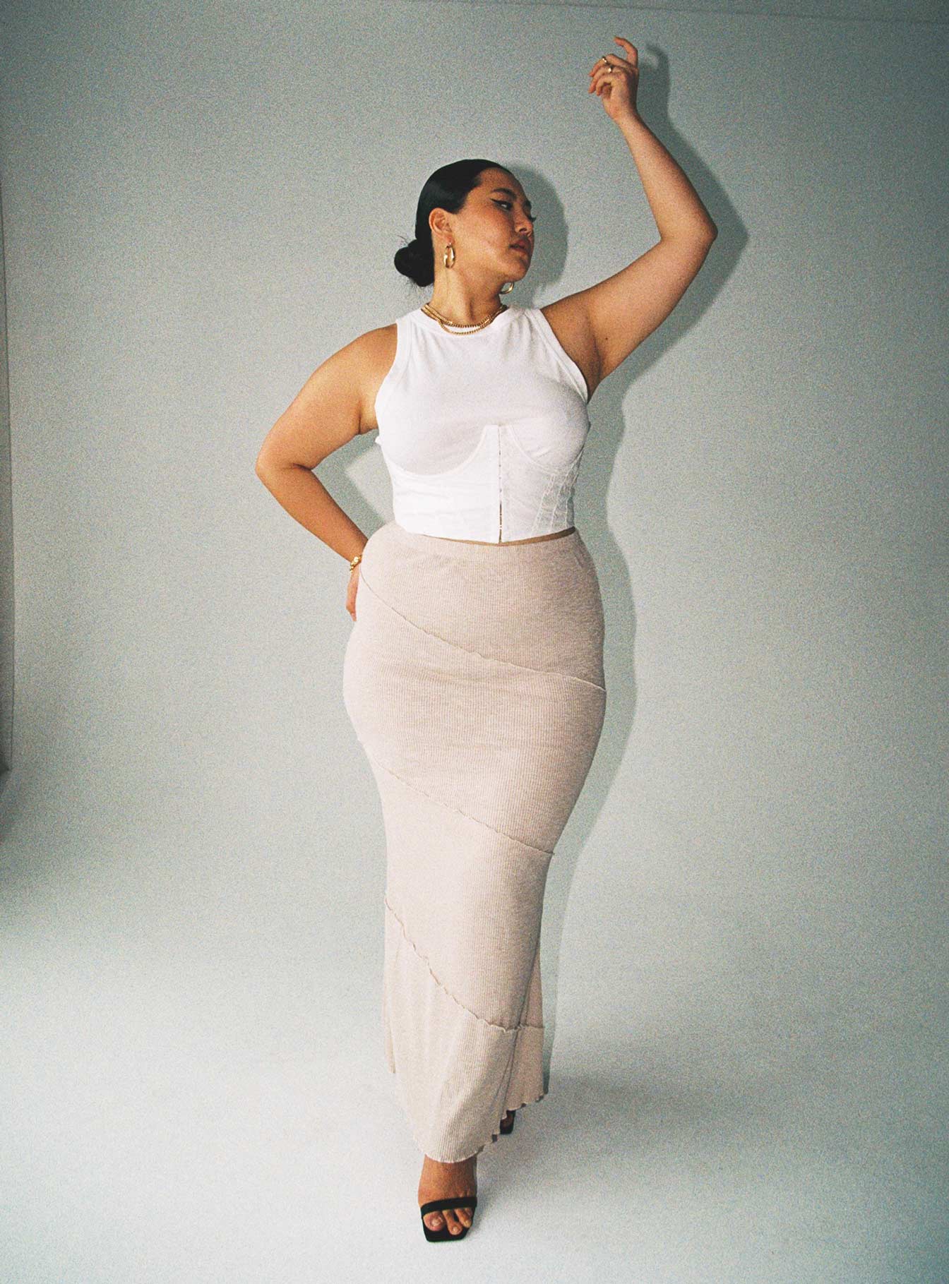   front view of model wearing Princess Polly Oscar Maxi Skirt Beige Curve Maxi 