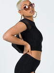 side view of model wearing Princess Polly Bold Move Top Black 