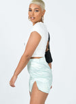   side view of model wearing Princess Polly Dillion Mini Skirt Green 