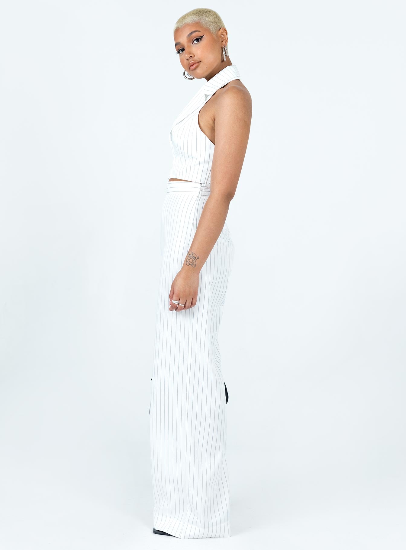 White matching set Pinstripe print Vest top Halter neck Hook & eye fastening at front Tailored pants Invisible zip fastening at side Wide leg