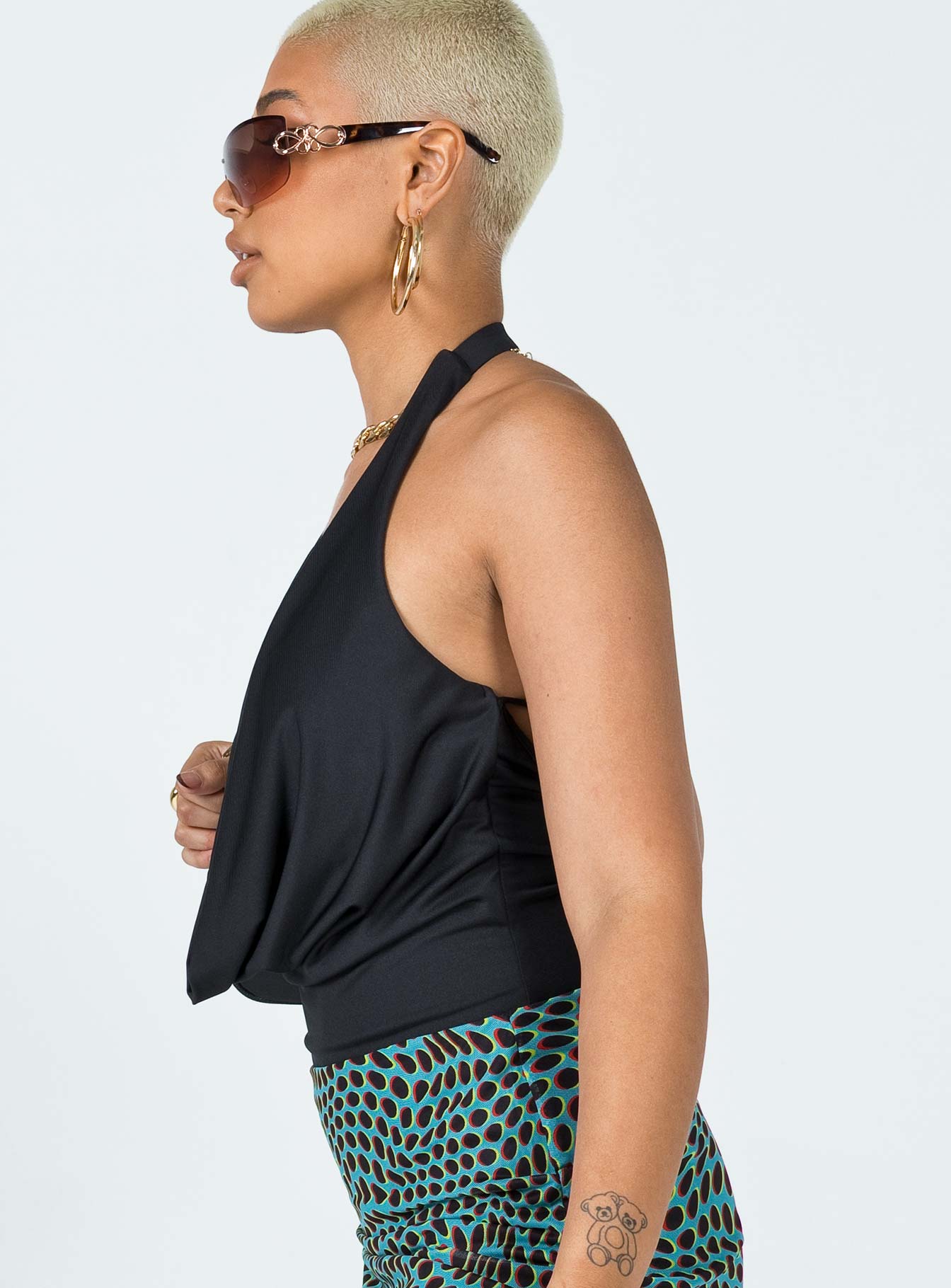 side view of model wearing Princess Polly Kayley Bodysuit Black Sleeveless Cowl 