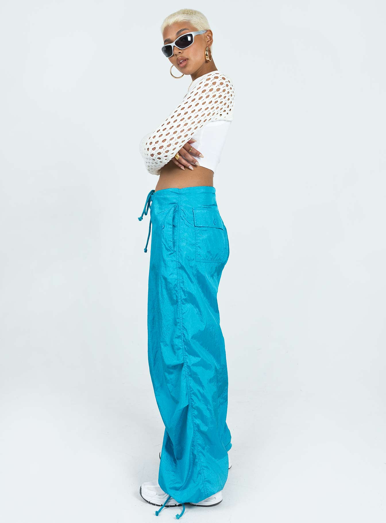 Front view of model wearing  front Princess Polly  Motel Chute Trousers Blue