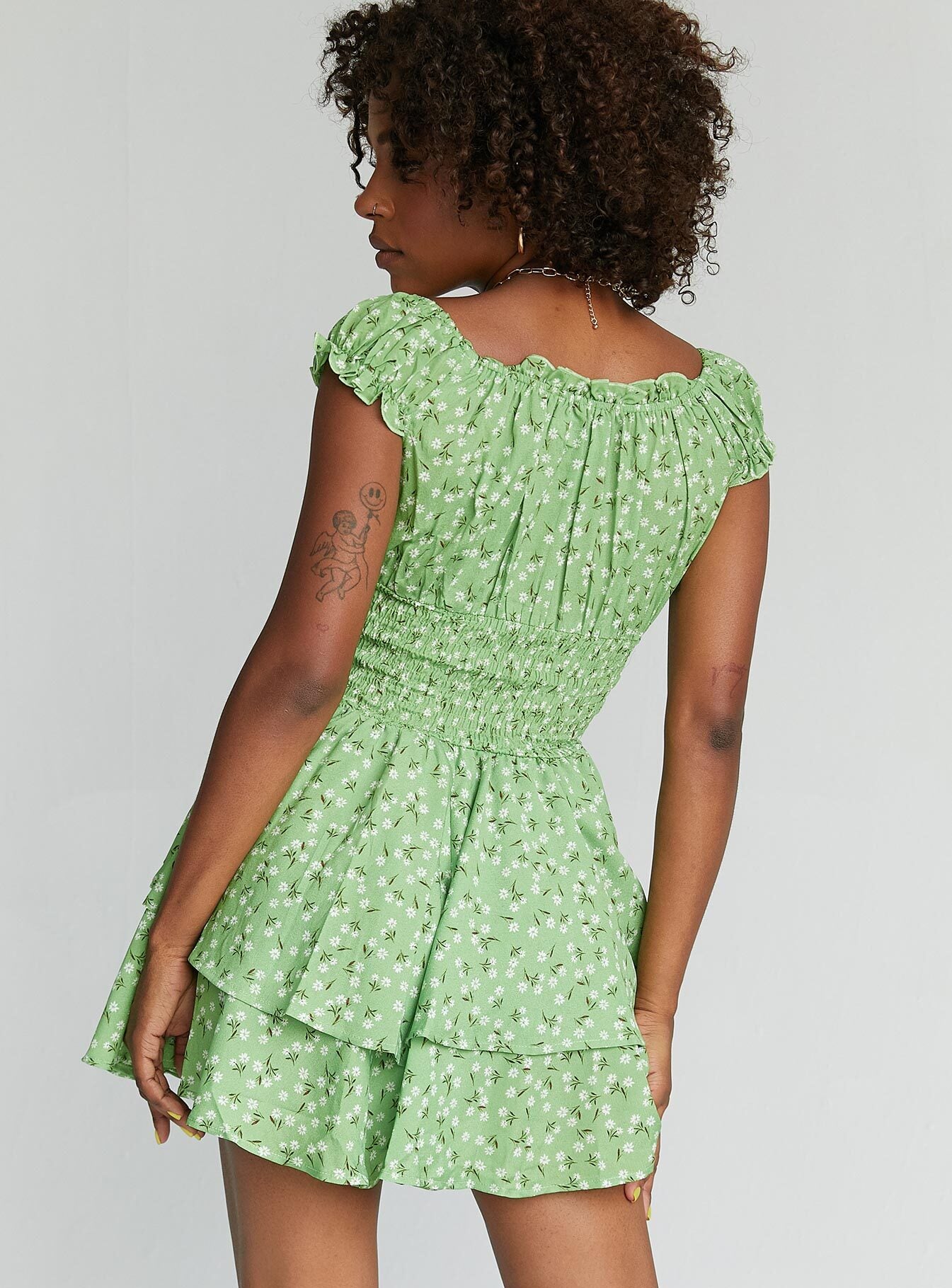 Romper Shirred waistband Ruffle detailing Elasticated neck & sleeves Layered hem Lined bust