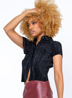 side view of model wearing Princess Polly Akira Shirt Black Short Sleeves V-Neck 