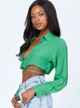 side view of model wearing Princess Polly Caprice Long Sleeve Top Green 