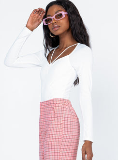 side view of model wearing Princess Polly Tori Long Sleeve Bodysuit White Full Sleeves Sweetheart 