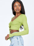 side view of model wearing Princess Polly Rayna Long Sleeve Top Green 