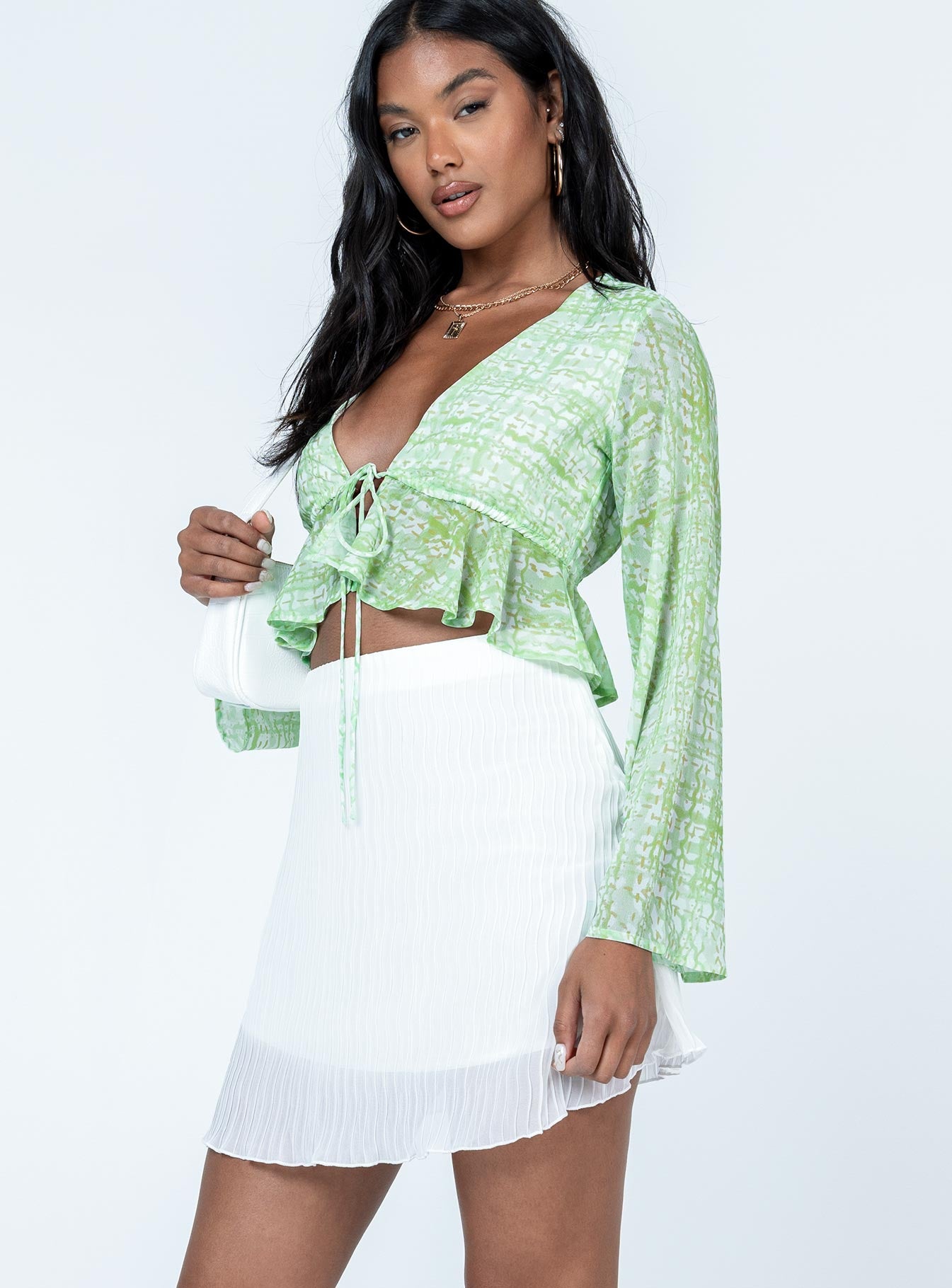   side view of model wearing Princess Polly The Morgie Mini Skirt White Mini Skirts 