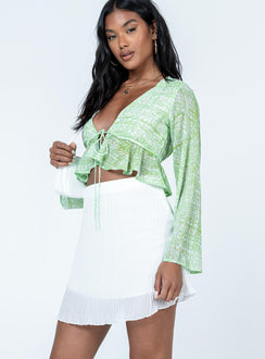   side view of model wearing Princess Polly The Morgie Mini Skirt White Mini Skirts 