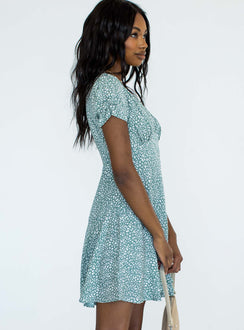 side view of model wearing Princess Polly The Sting Mini Dress Green Leopard 