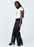 side view of model wearing Princess Polly Suki Pants Black 