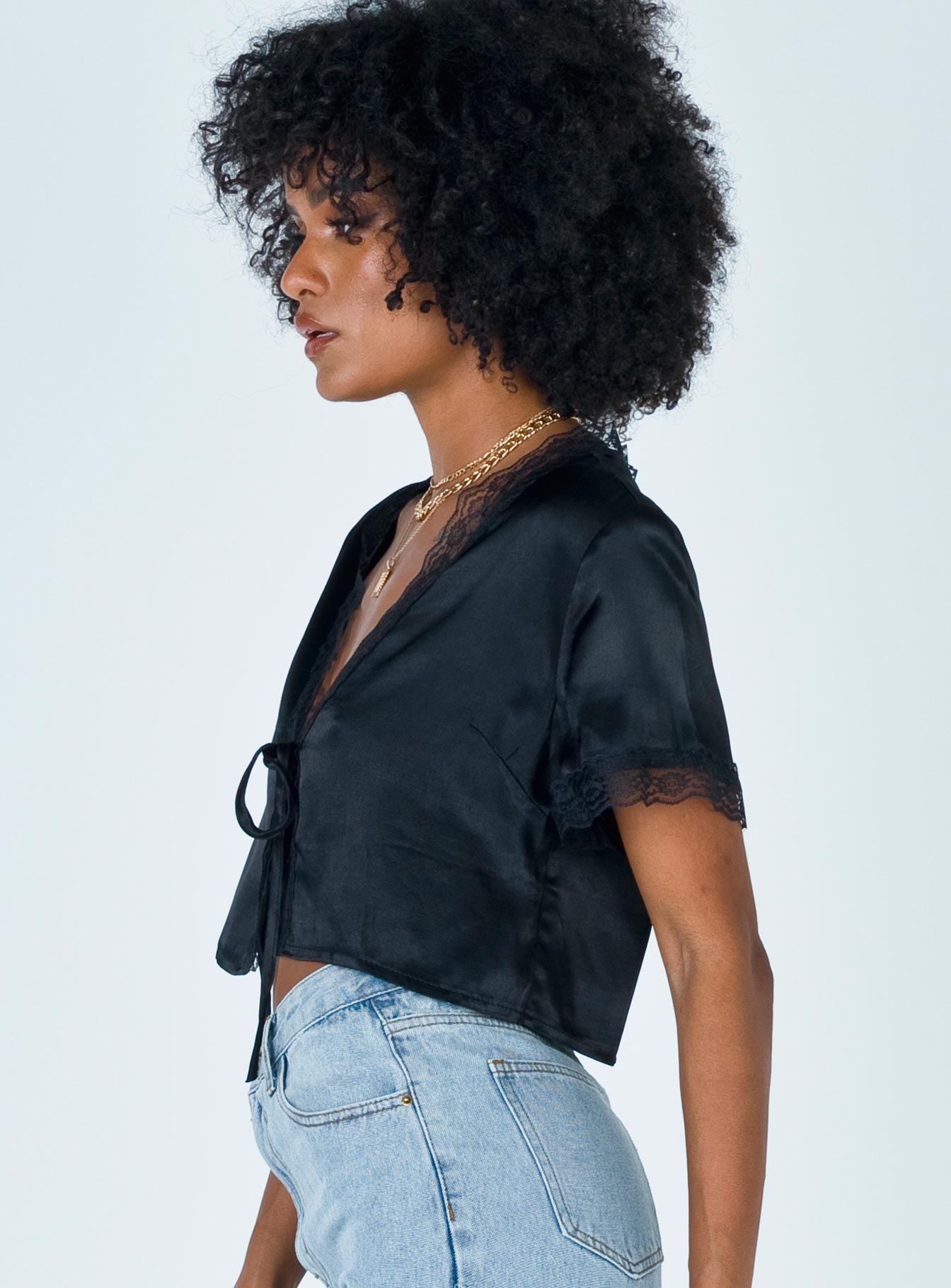 side view of model wearing Princess Polly Vintage Tie Up Top Black 