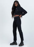 side view of model wearing Princess Polly Attica Knee Rip Denim Jeans Black Mid Rise 