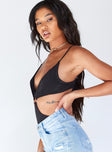 side view of model wearing Princess Polly Adelaide Bodysuit Black Sleeveless Plunger 