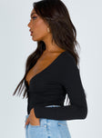 side view of model wearing Princess Polly Barlise Bodysuit Black Full Sleeves V-Neck 