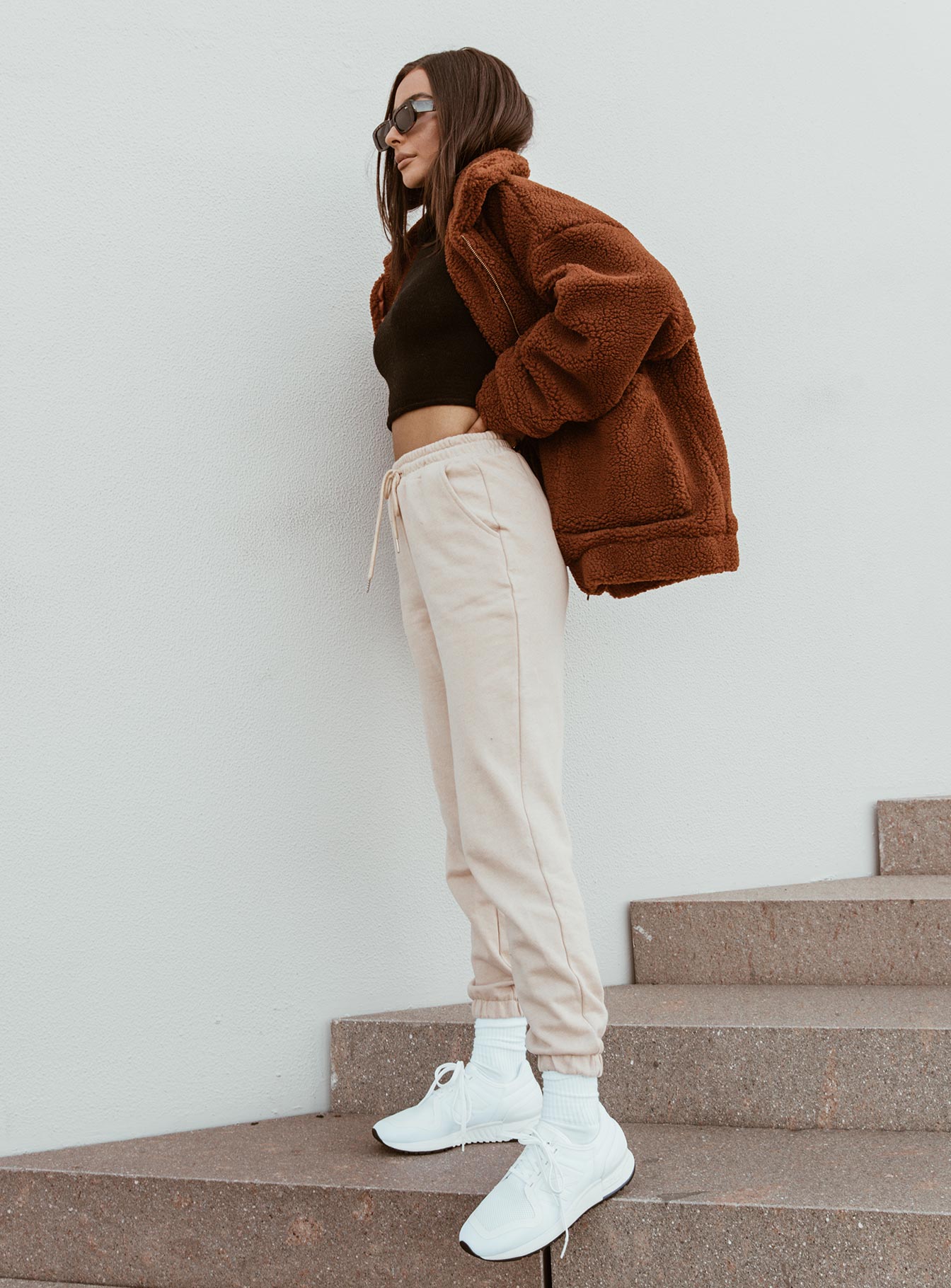 side view of model wearing Princess Polly Nero Sweat Pants Beige 