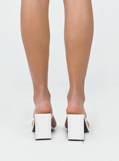 Heels Faux patent leather  Strappy upper  Shaved block heel Square toe 