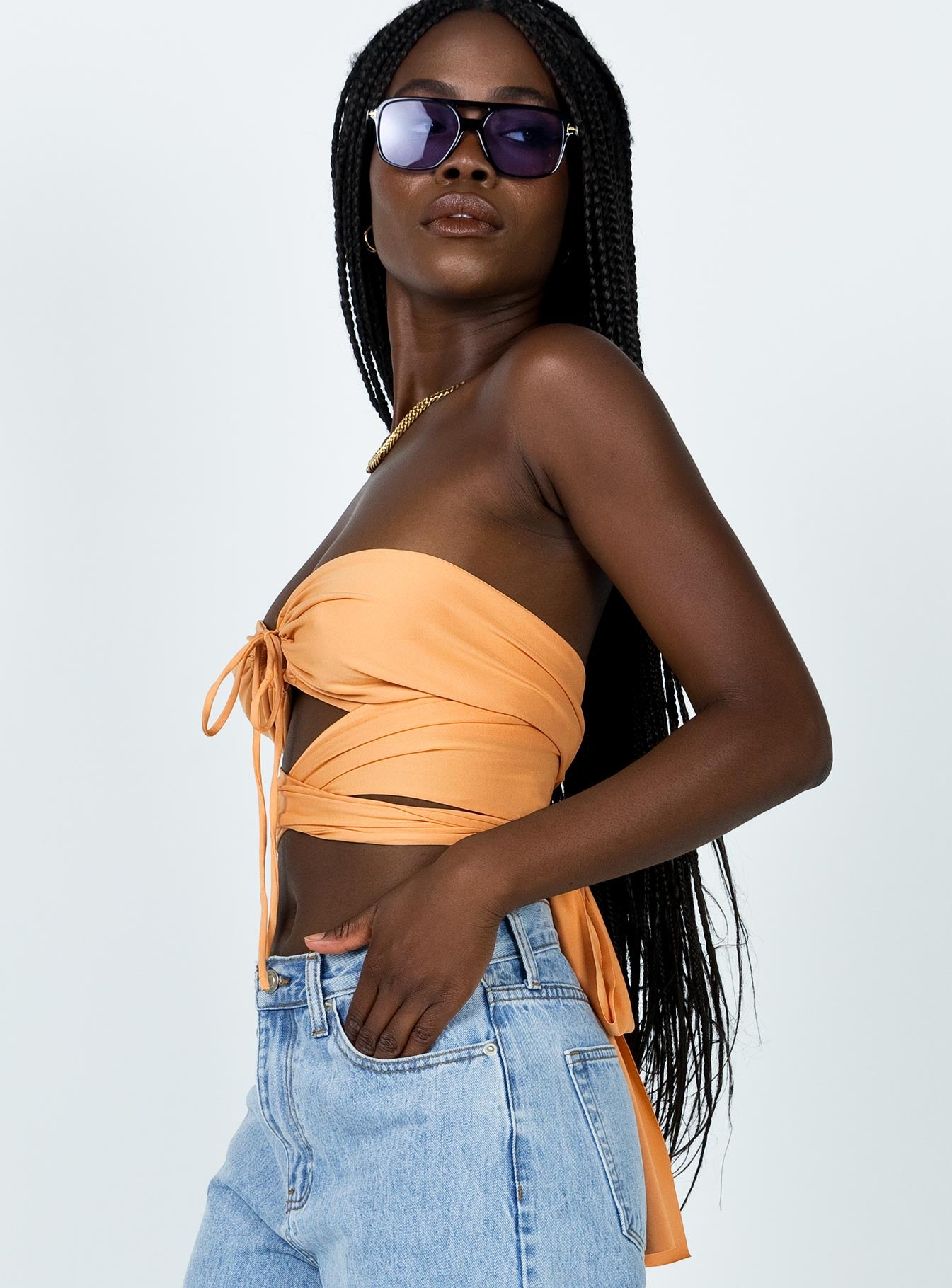 side view of model wearing Princess Polly Rochella Top Orange 