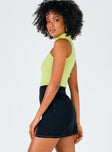   side view of model wearing Princess Polly The Lola Mini Skirt Contrast Stitching Black 