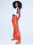 side view of model wearing Princess Polly Tayler Flare Pants Orange 