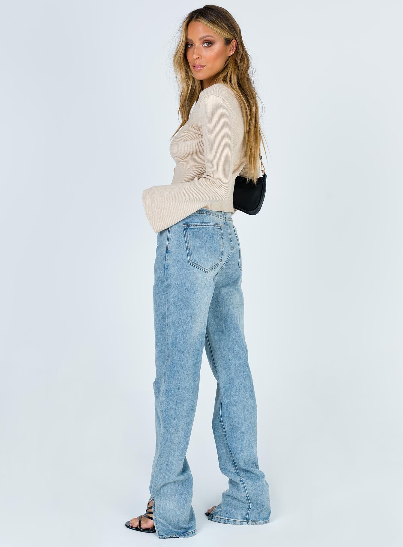 side view of model wearing Princess Polly Alabama Jean Mid Rise 