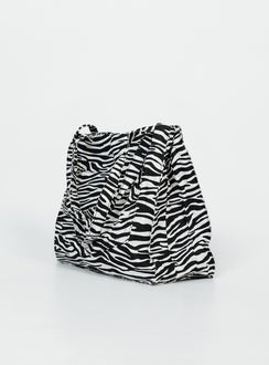 Bag  80% polyester 20% cotton Zebra print  Twin handles External & internal pockets Flat base  Magnetic button fastening 