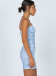 side view of model wearing Princess Polly Penney Mini Dress Blue Floral 