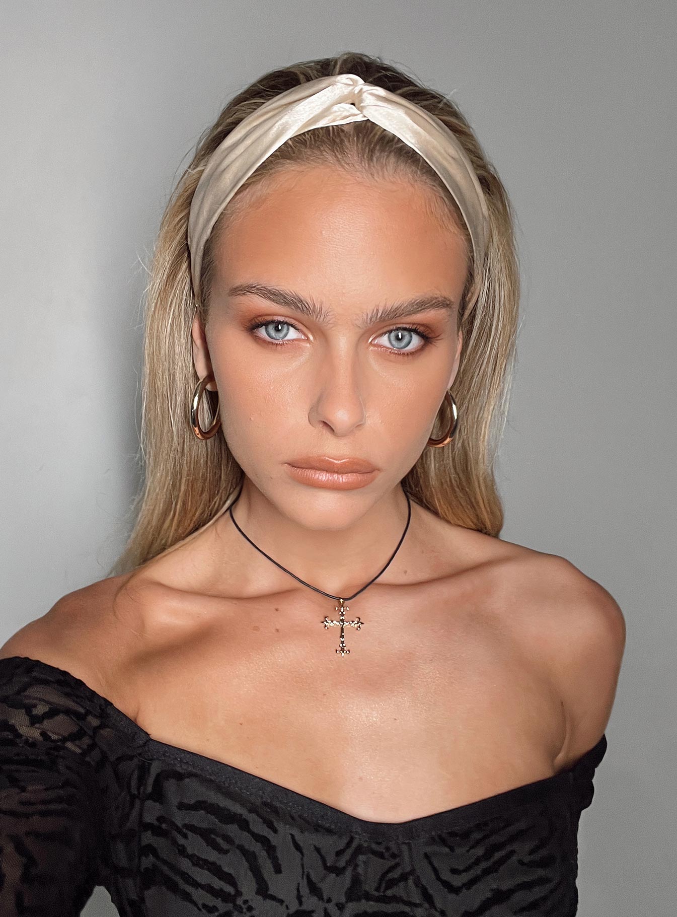 Head scarf Silky material Elasticated band at back Knot design Good stretch 