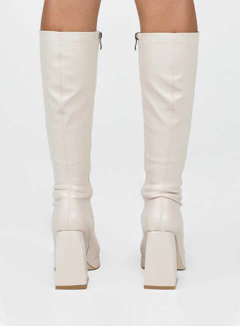 Knee-high boots Faux leather material Square toe Platform base Block heel Zip fastening at side Padded footbed