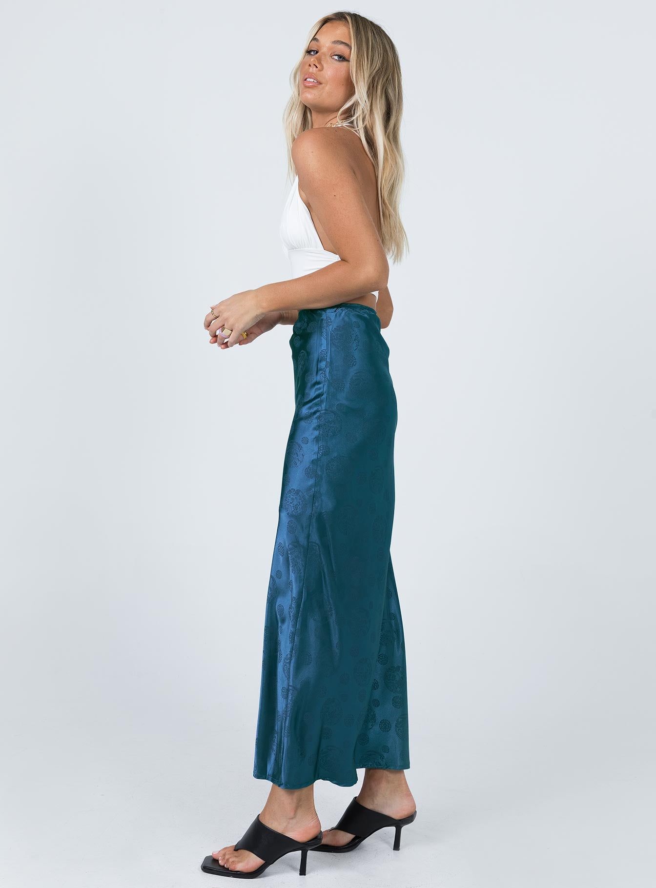   side view of model wearing Princess Polly Hailey Midi Skirt Blue 