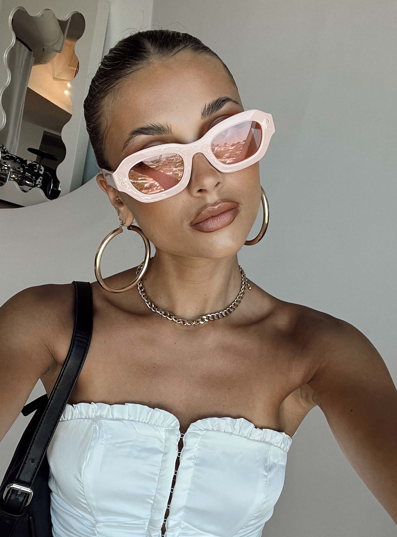 Sunglasses  80% PC  20% AC UV 400 Pink tinted lenses  Moulded nose bridge 