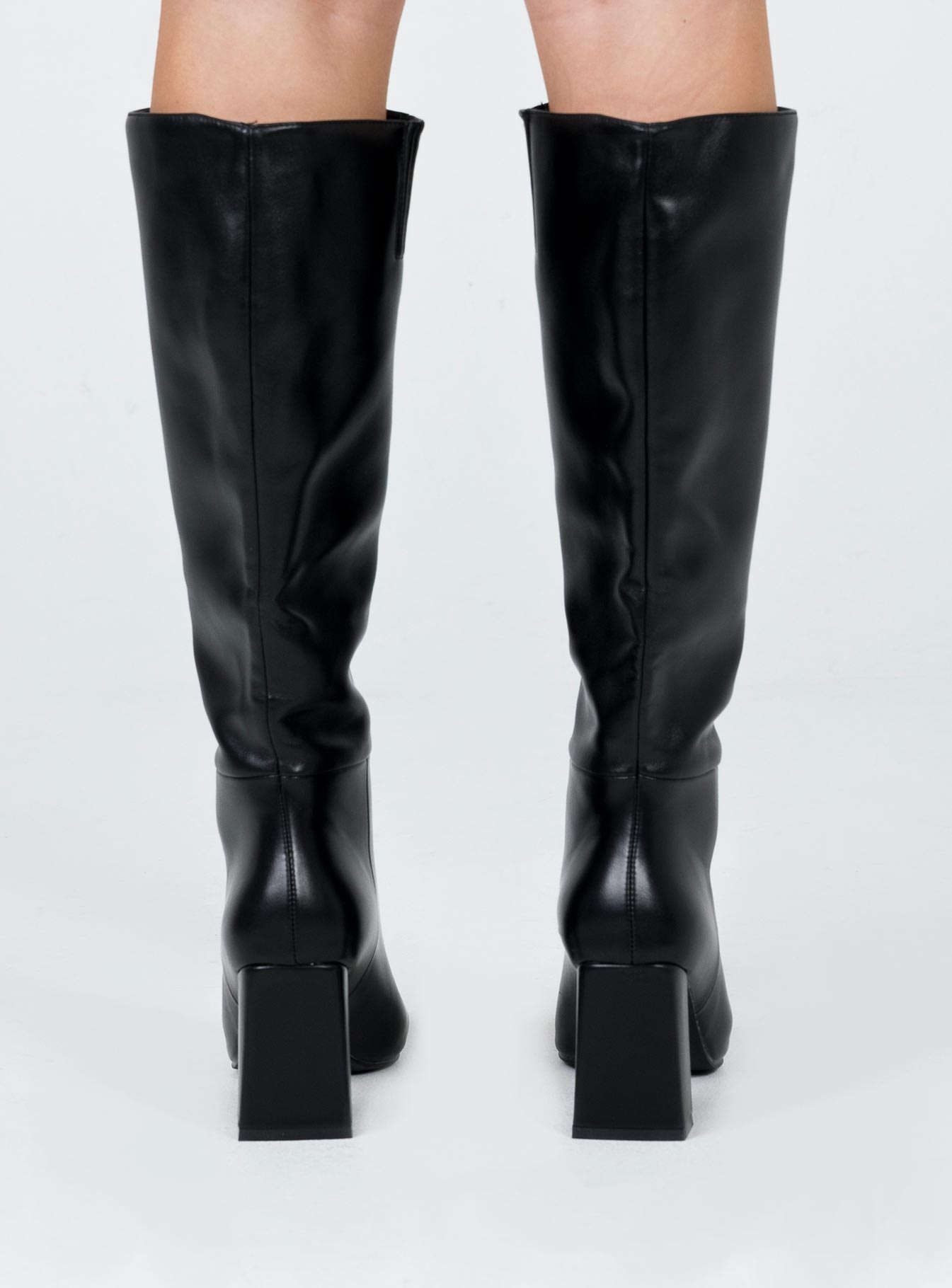 Knee high boots  Princess Polly Exclusive Upper: 100% PU Lining: 100% Textile Outsole: 100% TPU Faux leather material  Slip on design   Pointed toe  Block heel 
