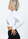 side view of model wearing Princess Polly Butterfly Long Sleeve Top White 