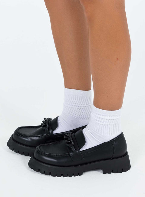 Loafers Faux leather material Chain snaffle Chunky treaded sole Rounded toe Padded footbed