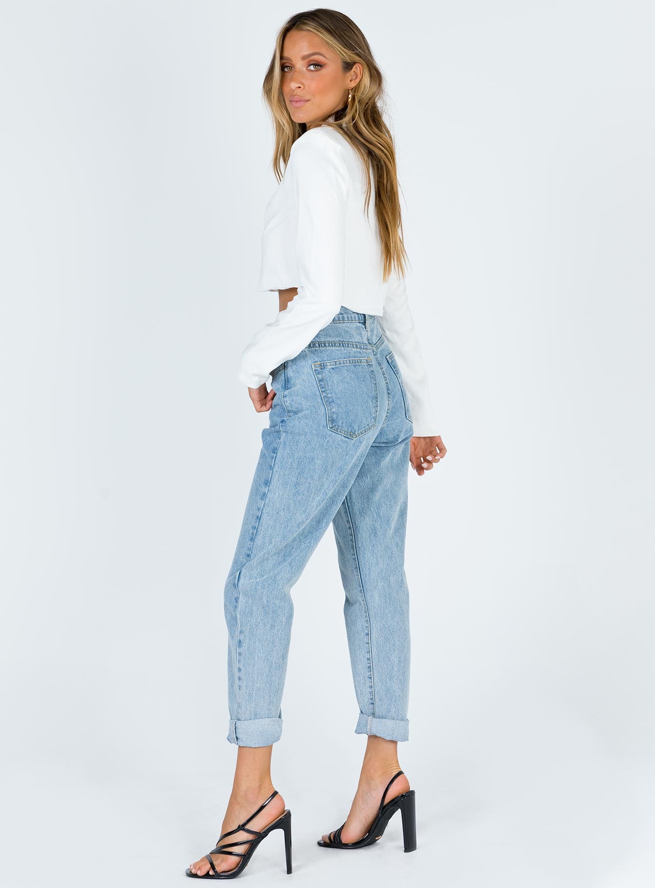 side view of model wearing Princess Polly Tyler Jean Mom Jean Mid Wash Denim High Waisted 