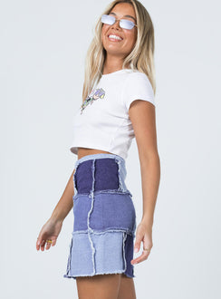   side view of model wearing Princess Polly Catherine Patchwork Mini Skirt Denim 