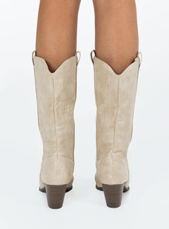 Cowgirl boots Faux leather material  Detail stitching  Mid calf length  Pull tabs  Pointed toe Block heel 