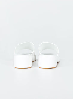 Sandals Faux leather material Single wide upper Square toe  Padded footbed  Platform base 