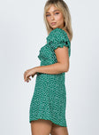 side view of model wearing Princess Polly Freyah Floral Mini Dress Green 