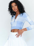 side view of model wearing Princess Polly Unwritten Love Top Blue Check 