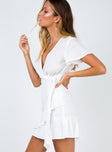 side view of model wearing Princess Polly Company For One Wrap Dress White 