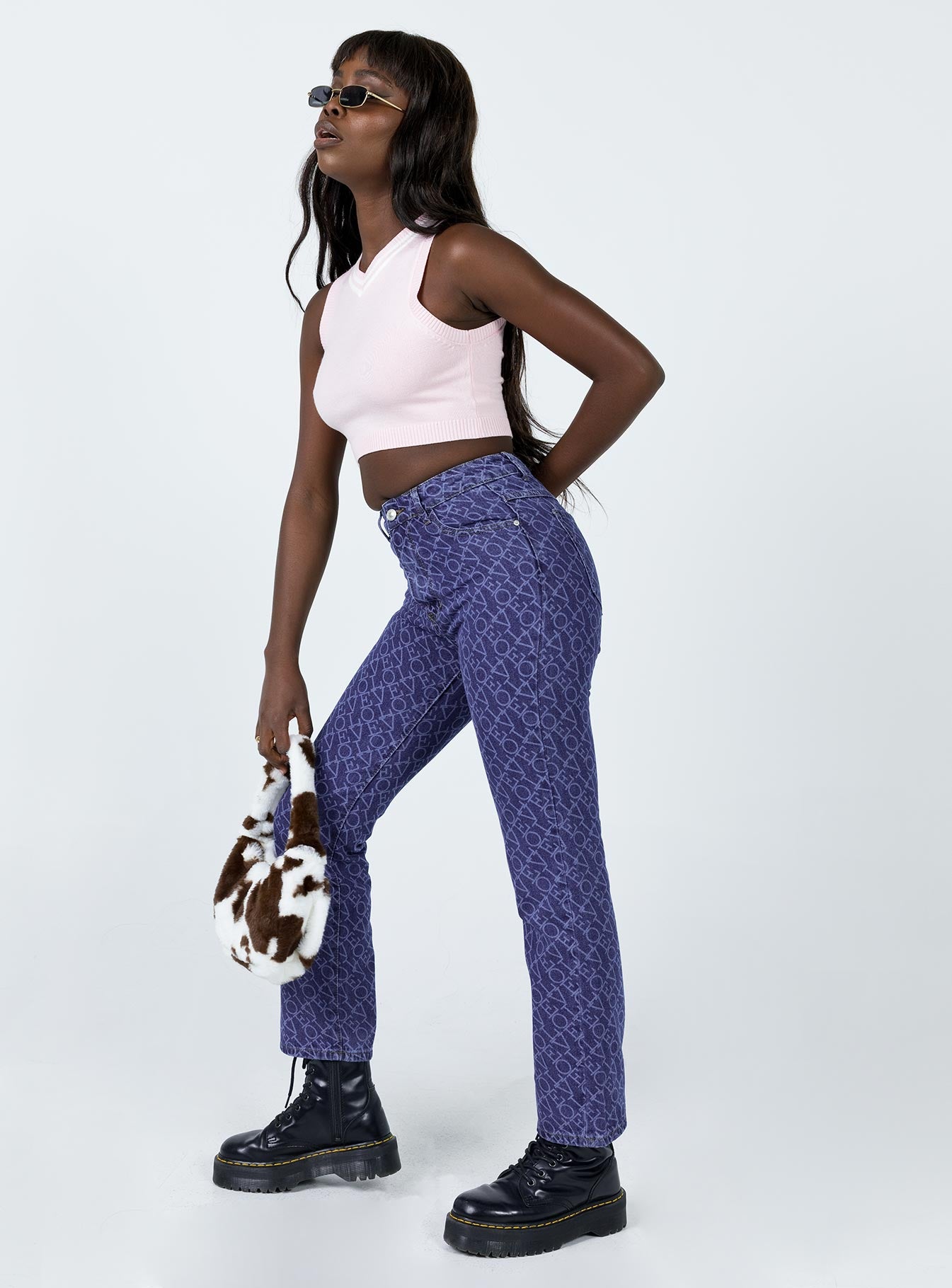 side view of model wearing Princess Polly Love Lounge Denim Jeans Mid Rise 