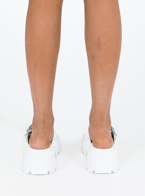 Sandals Faux leather material Platform base Square toe Double strap upper Silver toned buckles Padded footbed Treaded sole