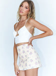   front view of model wearing Princess Polly Selby Mini Skirt Floral Yellow 